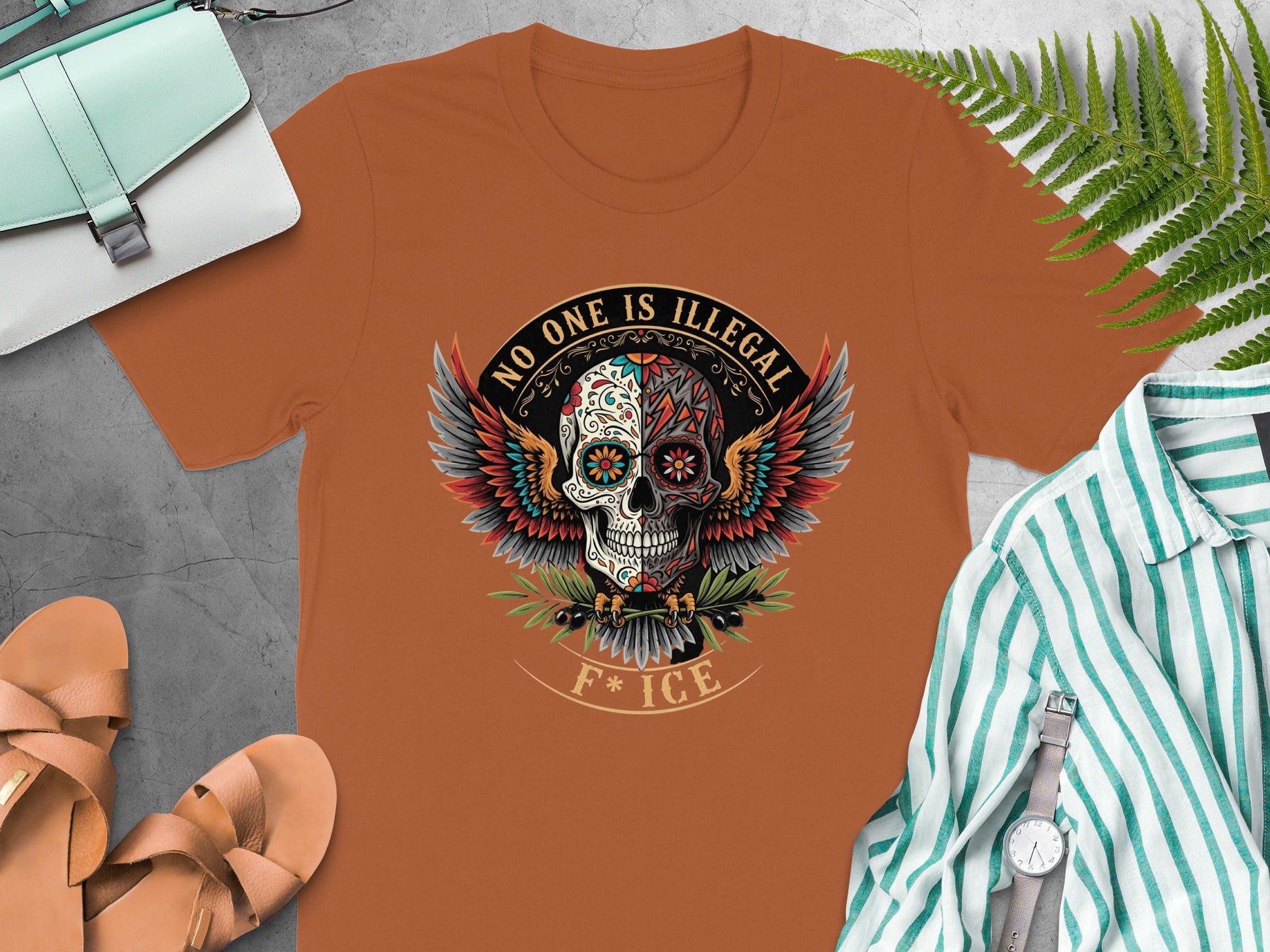 No One Is Illegal Skull Design Graphic Tee product type