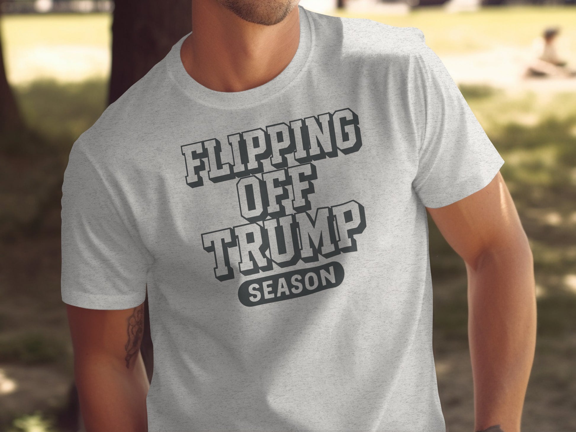 Flipping Off Trump Season Statement Tee Product