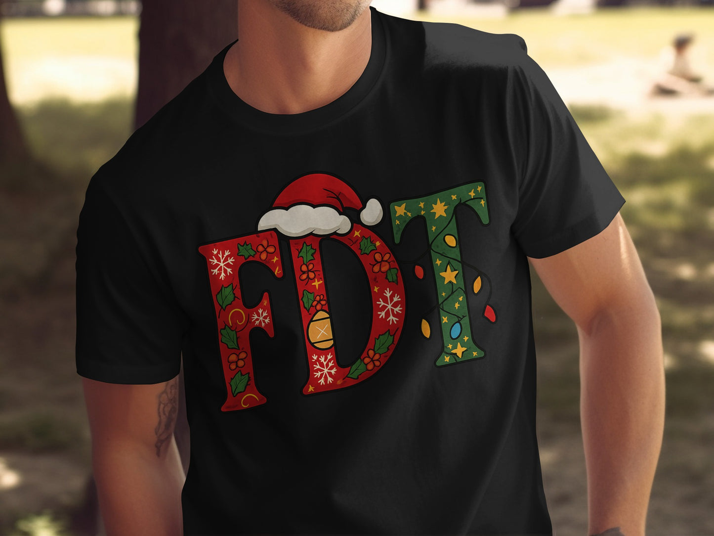 Festive FDT graphic tee with holiday themed lettering
