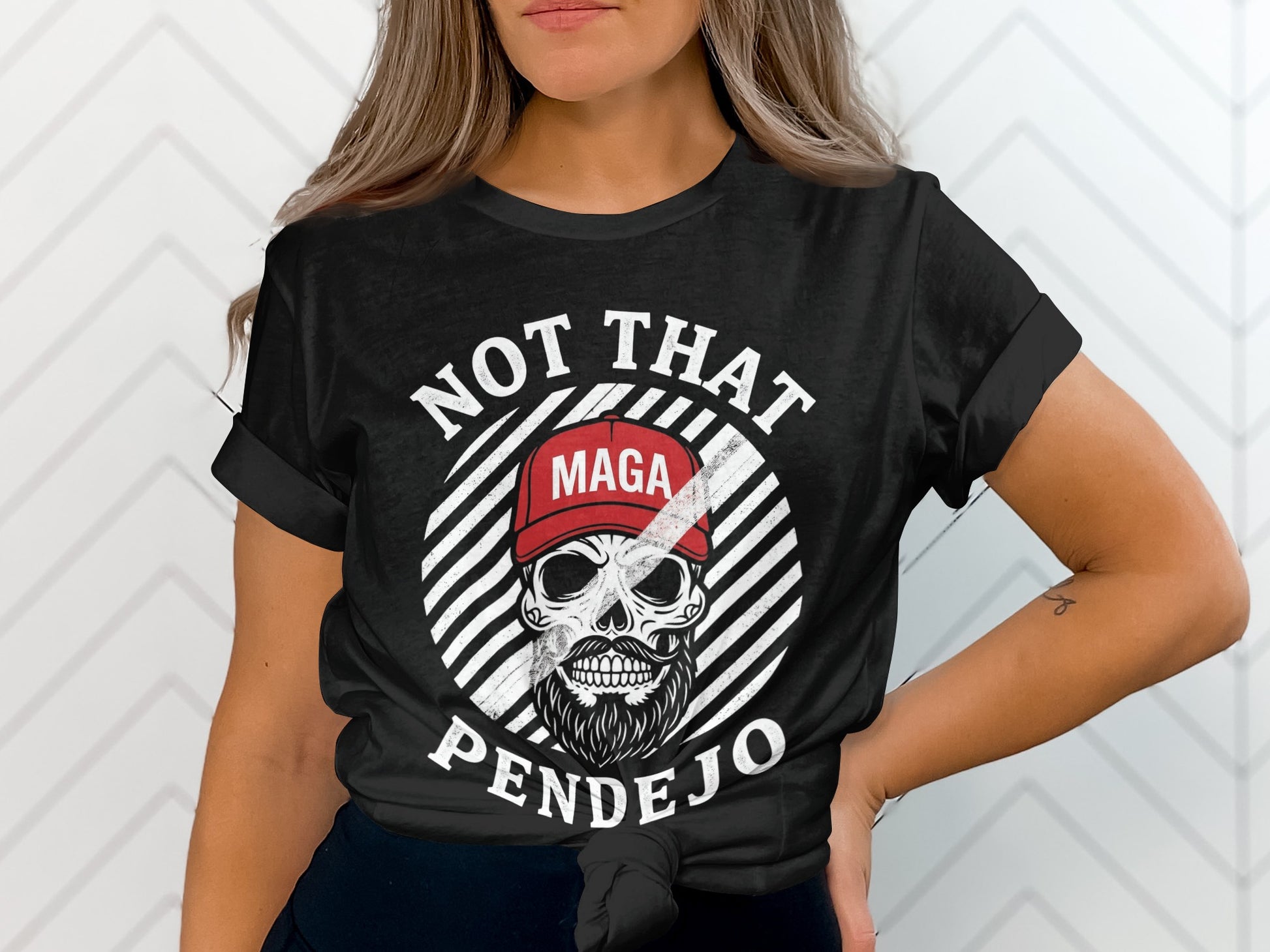 Black t-shirt with skull wearing a MAGA hat, text "NOT THAT PENDEJO".