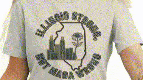 A person wearing a gray t-shirt with a graphic design that says "Illinois Strong. Not MAGA wrong" around a graphic of the state of Illinois.