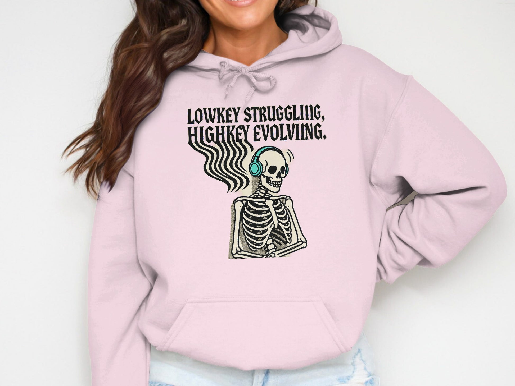 Lowkey Struggling Highkey Evolving Skeleton Hoodie product type