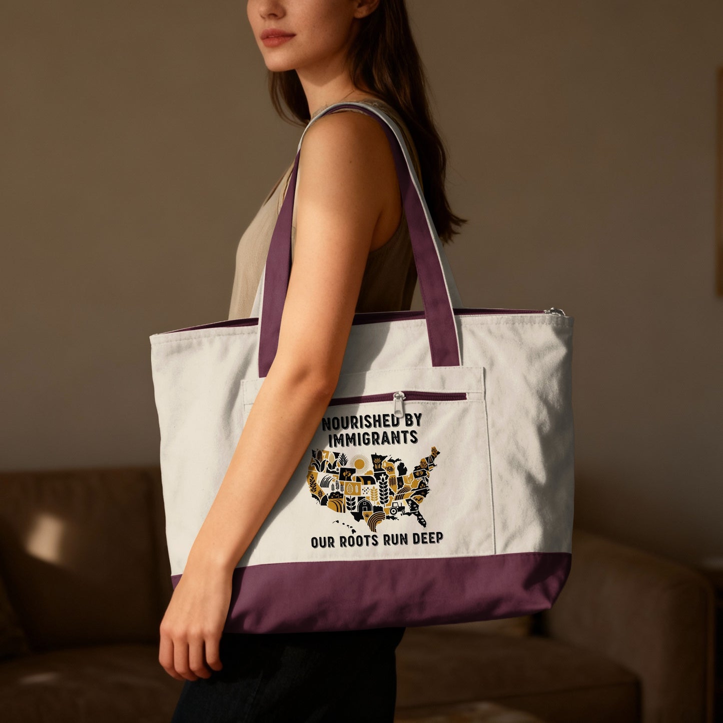 Tote bag with a USA map design and text "Nourished by Immigrants Our roots run deep."