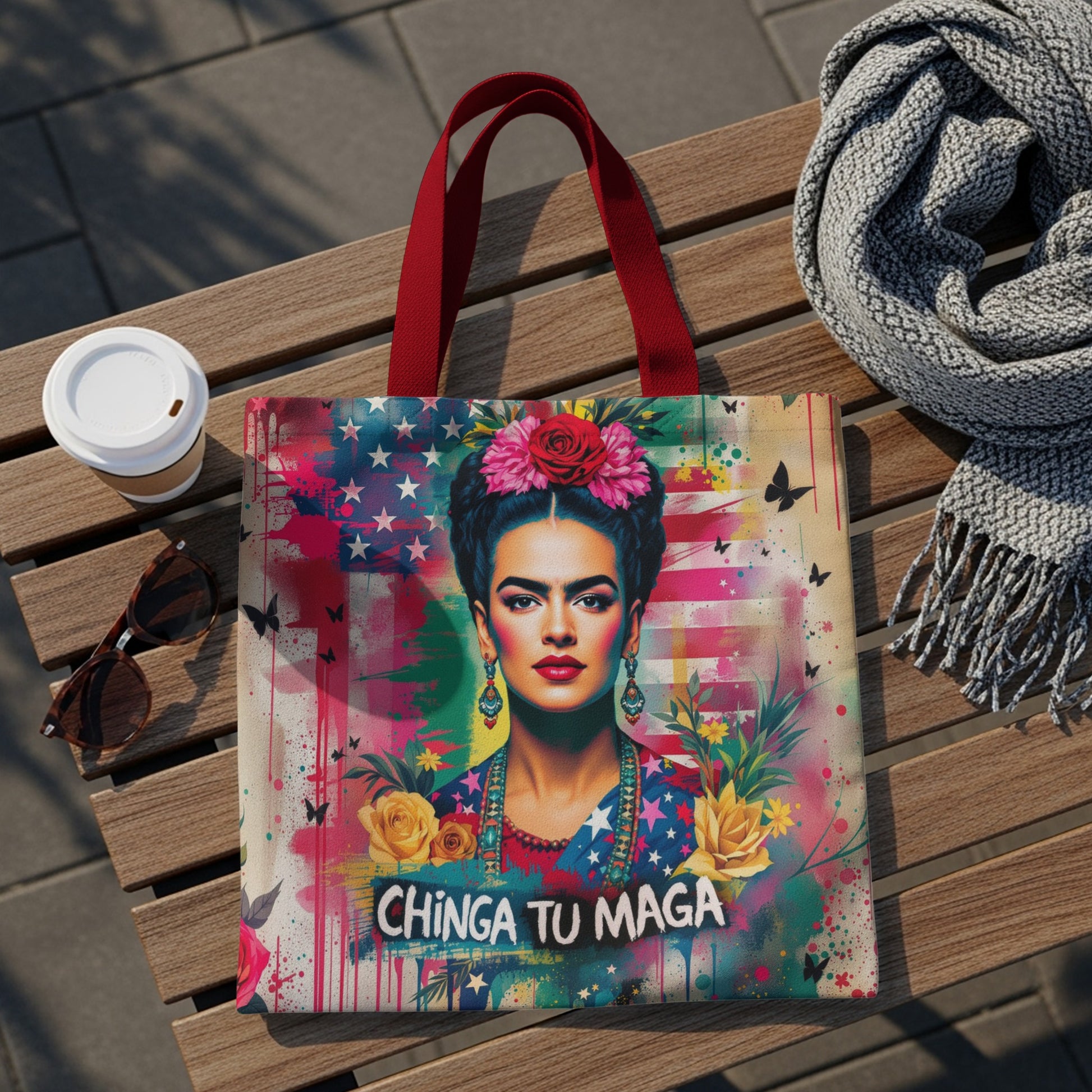 Tote bag featuring Frida Kahlo portrait with colorful background and "Chinga Tu Maga" text.