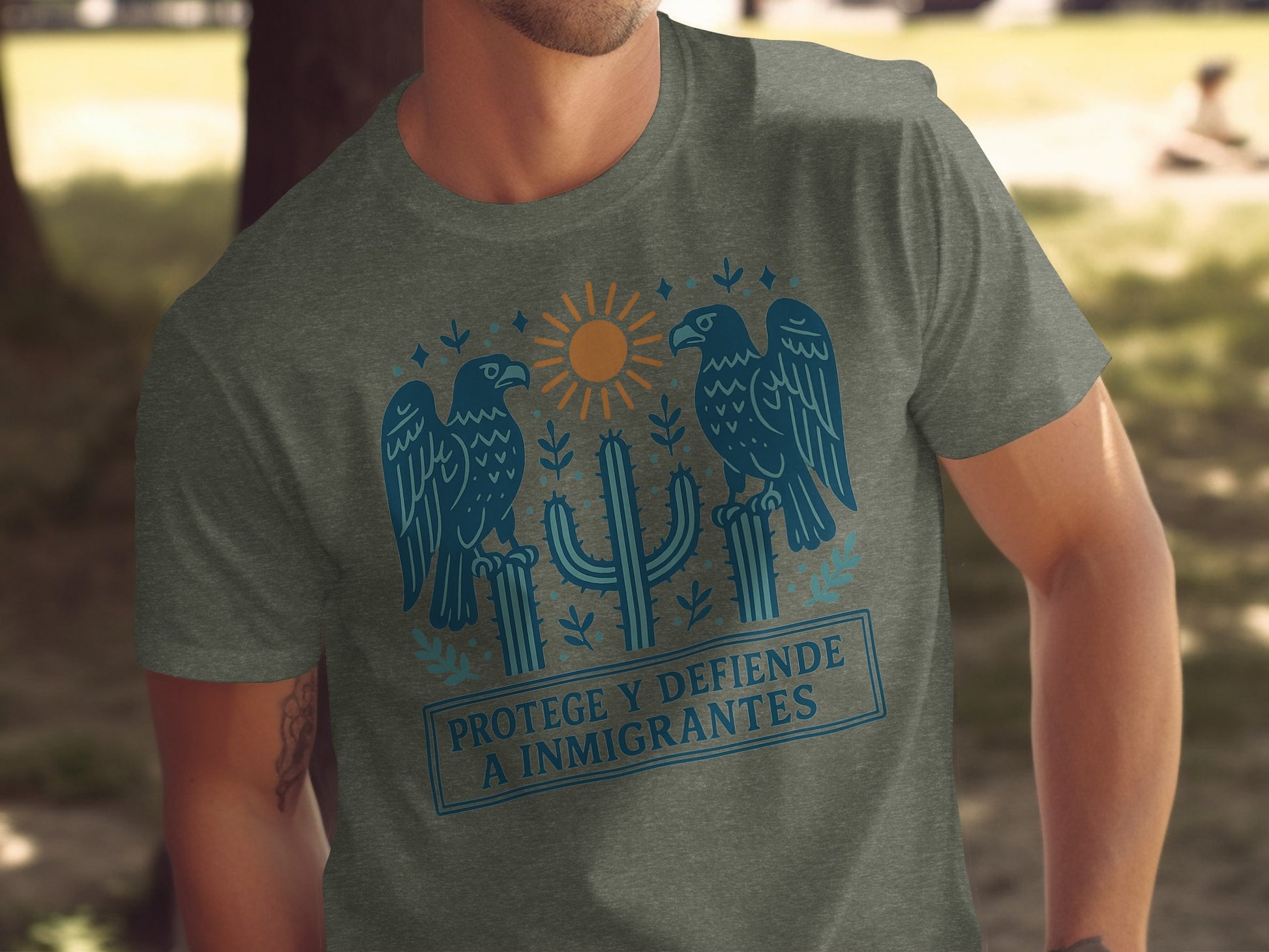Protege y Defiende a Inmigrantes Graphic T-Shirt product