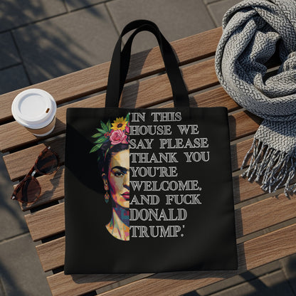 Tote bag with Frida Kahlo portrait and bold political text.