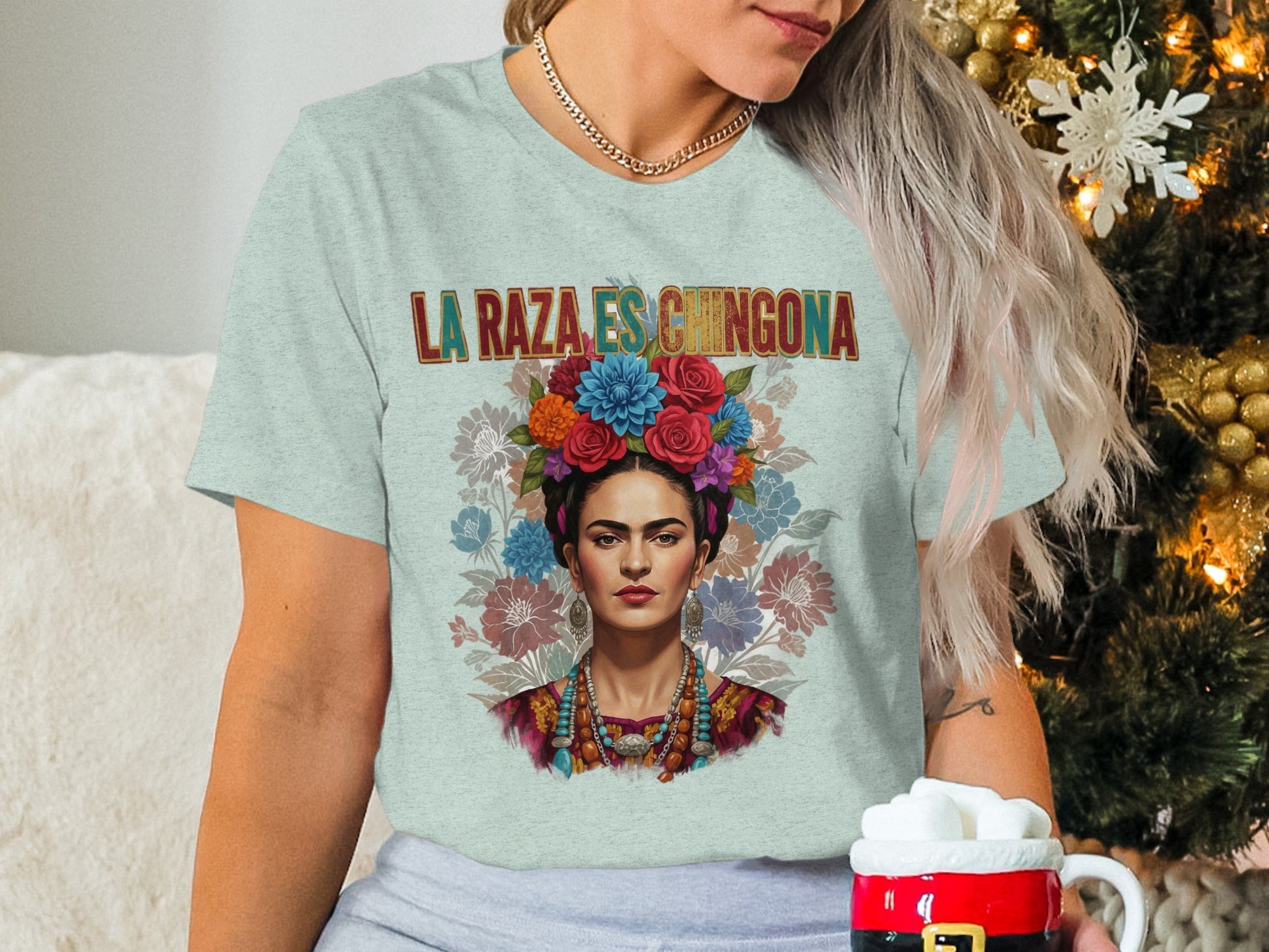 La raza es chingona shirt with colorful floral design