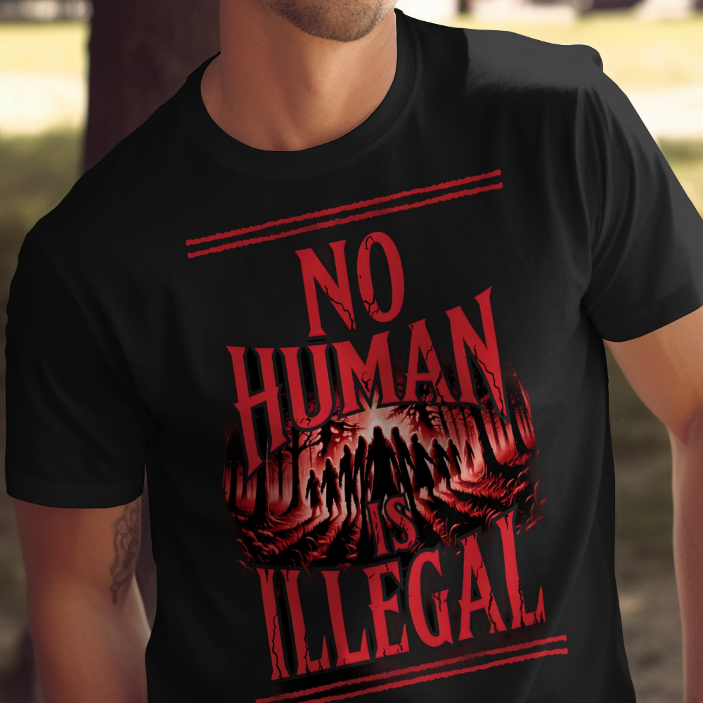 Black t-shirt with "NO HUMAN IS ILLEGAL" text and shadowy figures in a forest.