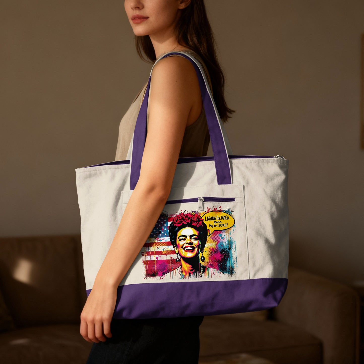 Woman models tote bag with colorful graphic of a woman and flag.
