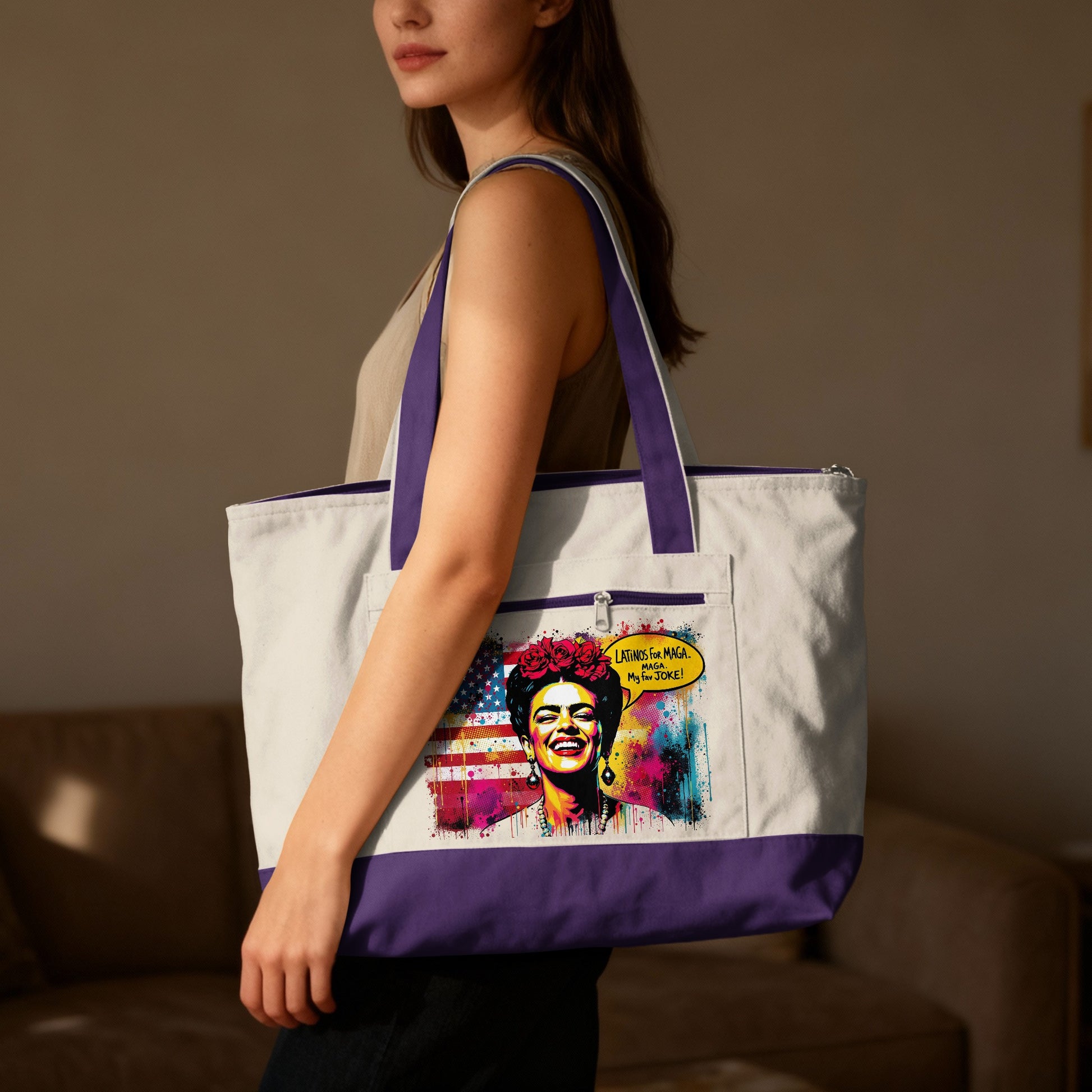 Woman models tote bag with colorful graphic of a woman and flag.