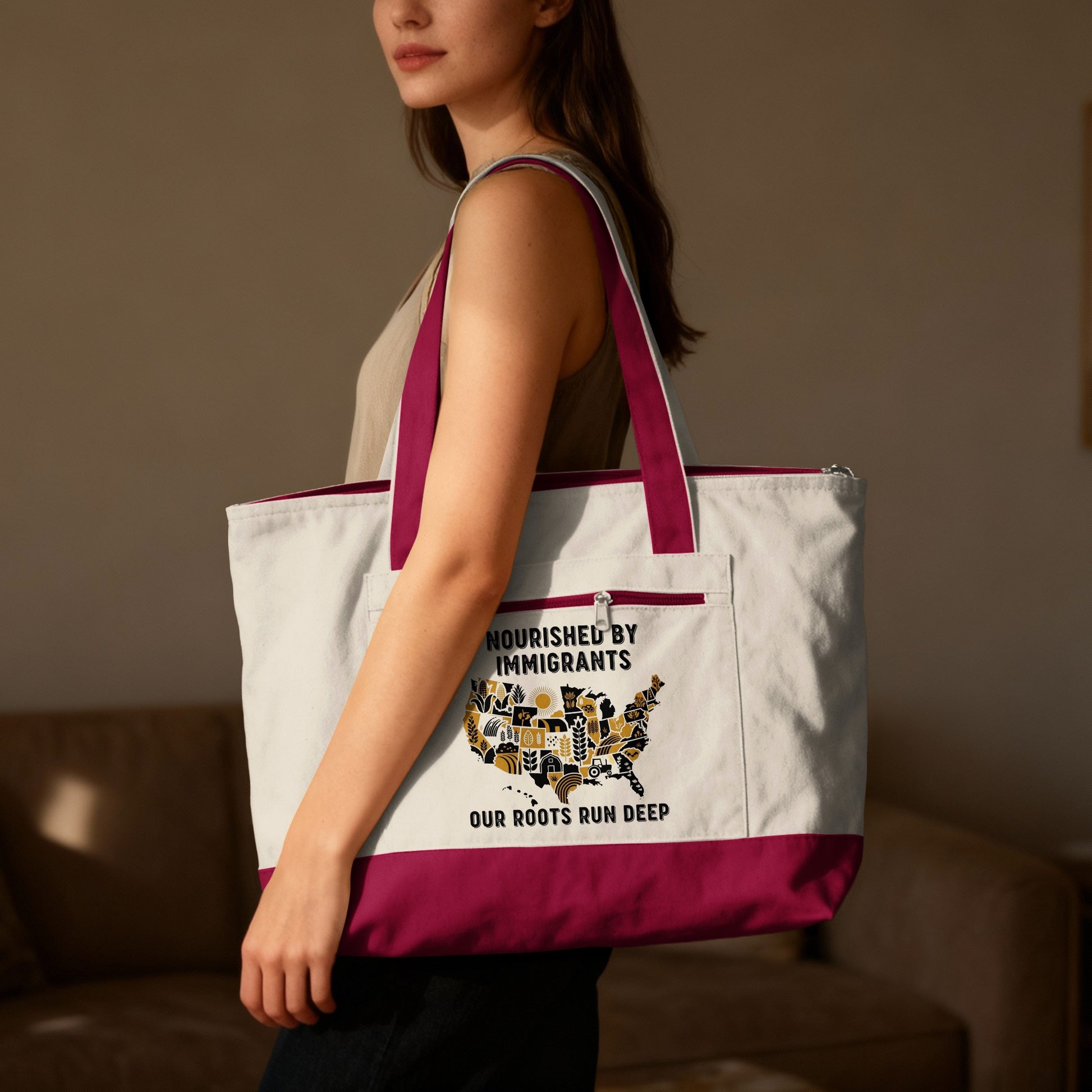 Tote bag with "Nourished by Immigrants" and "Our roots run deep" text and map of USA.