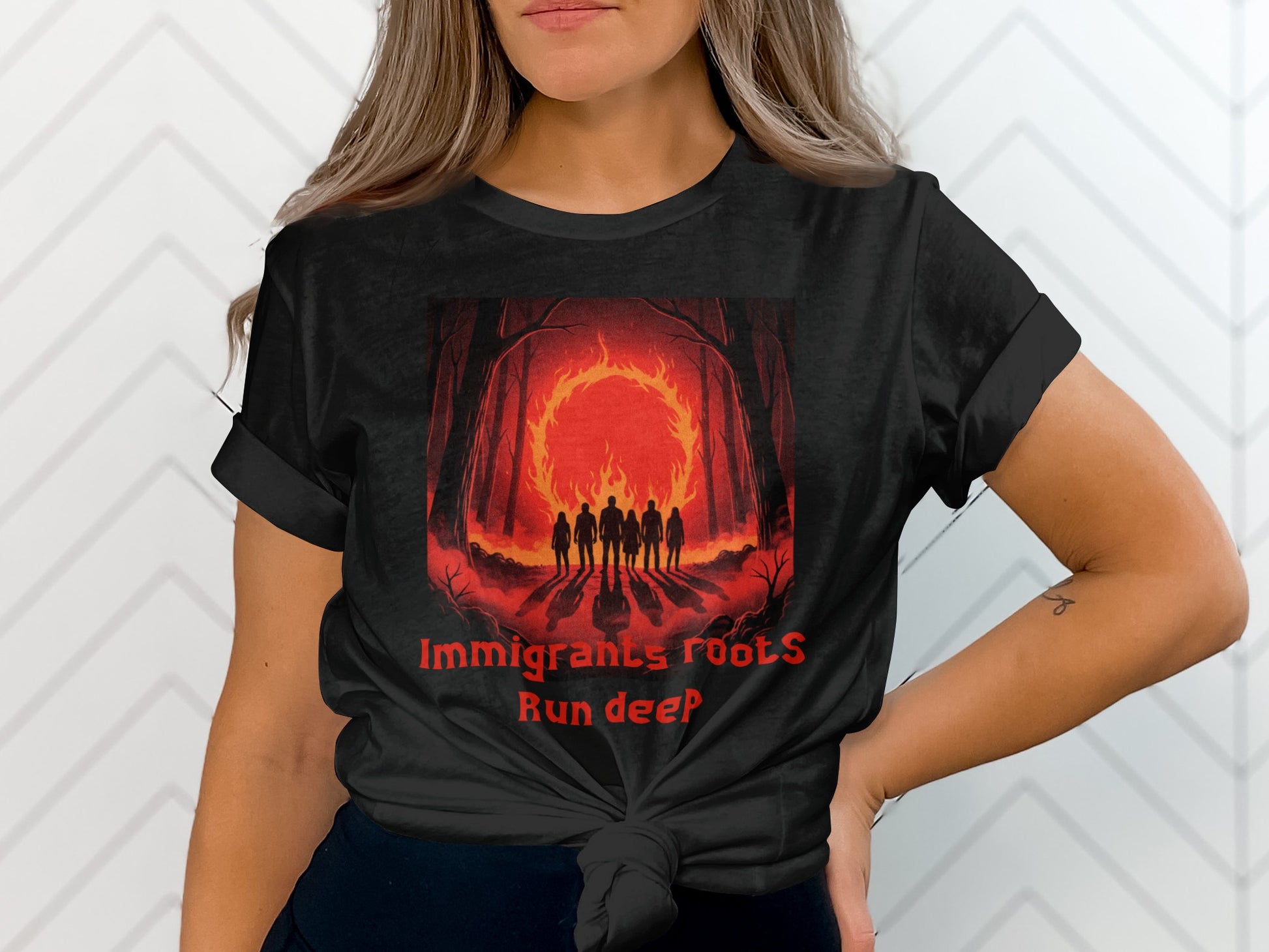 Black t-shirt with "Immigrants roots run deep" and a fiery forest scene.