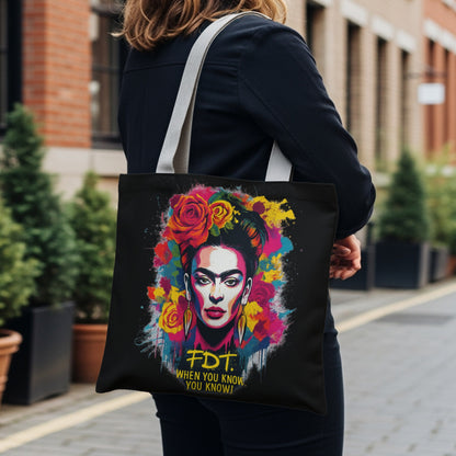 Black tote bag featuring a colorful Frida Kahlo portrait with "FDT. WHEN YOU KNOW YOU KNOW."