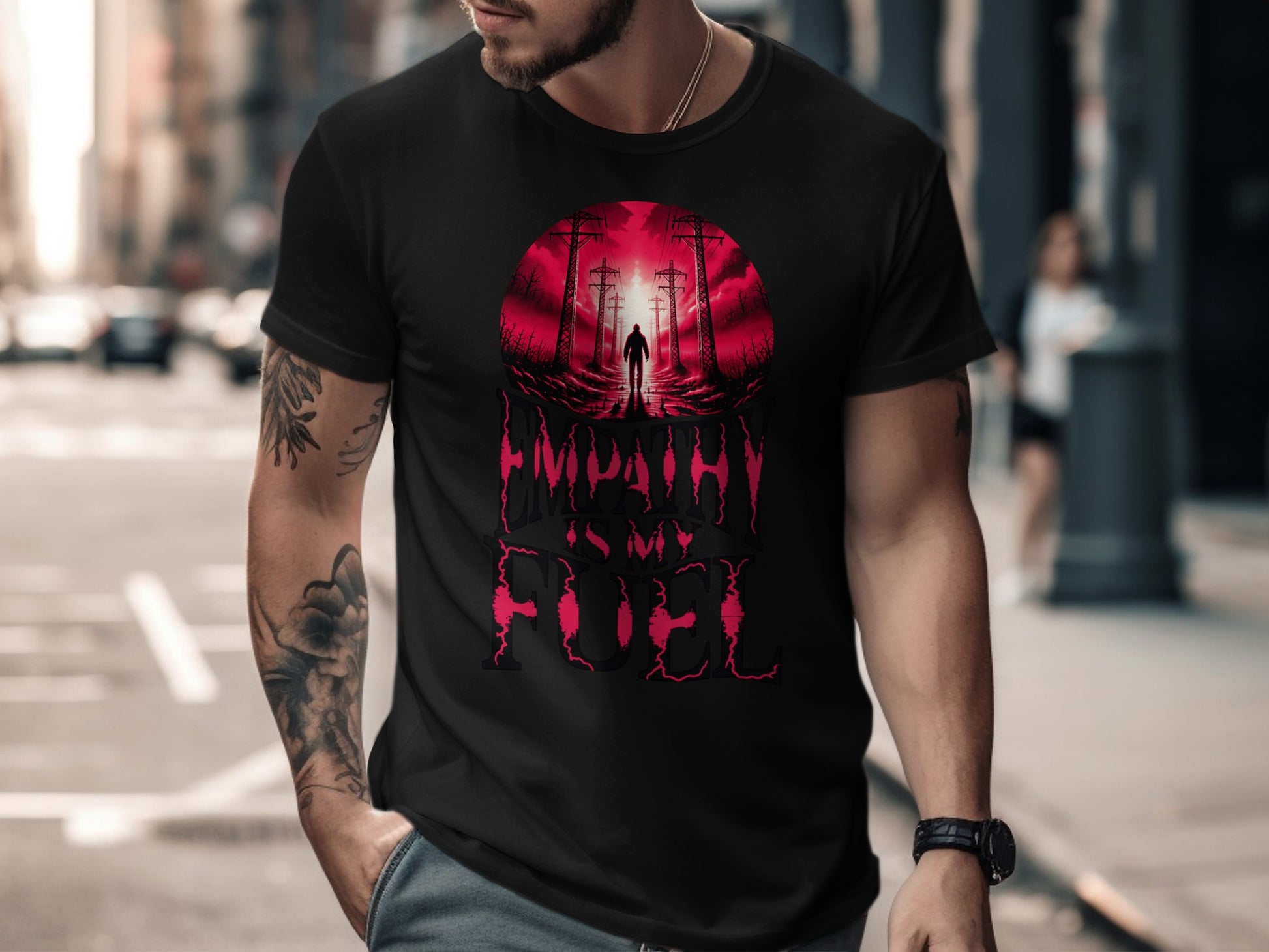 Black t-shirt with red graphic of silhouette walking towards power lines.