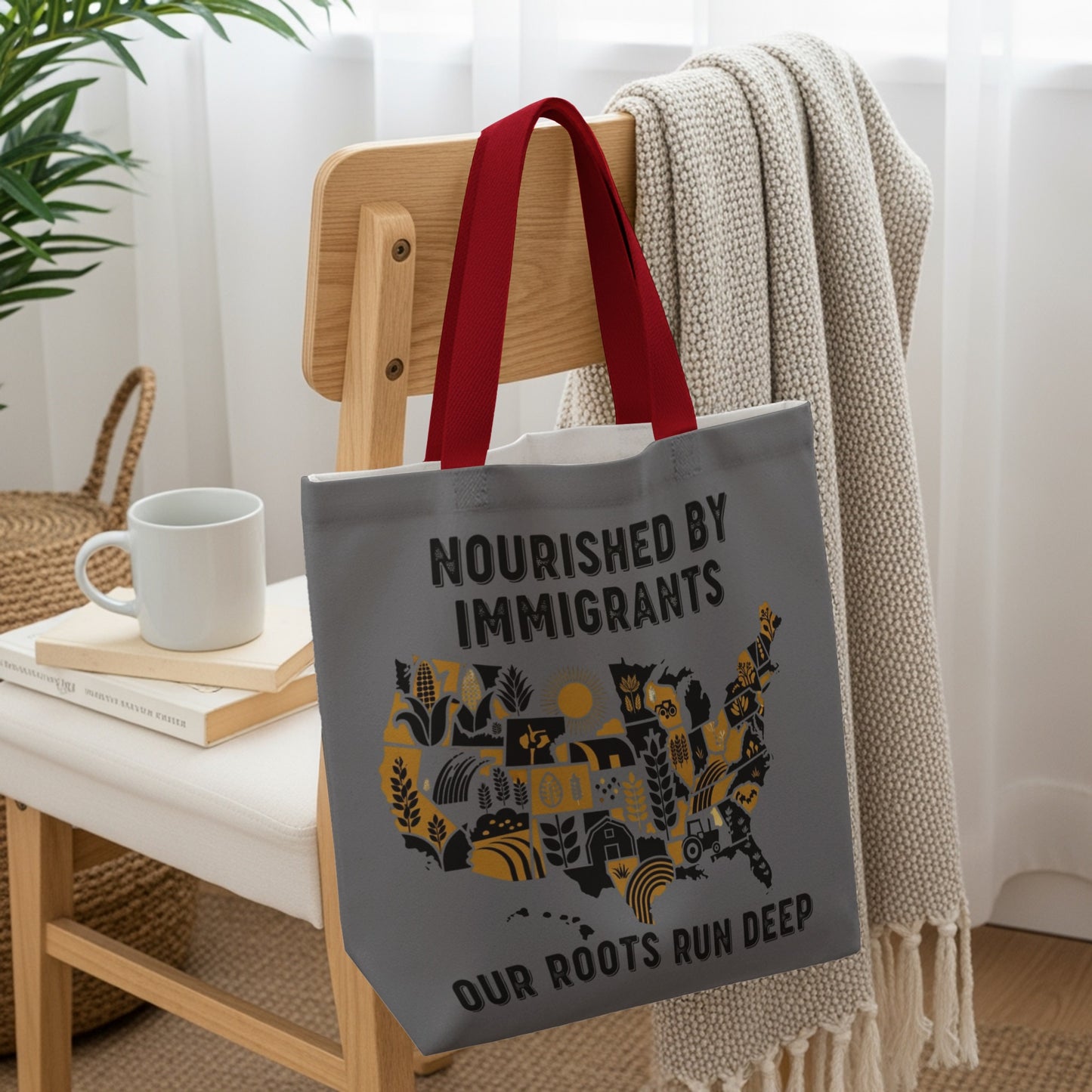 Gray tote bag with a map of the US featuring farm icons and text.