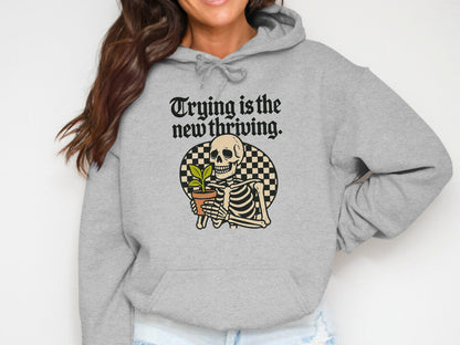 Trying is the new thriving skeleton hoodie product
