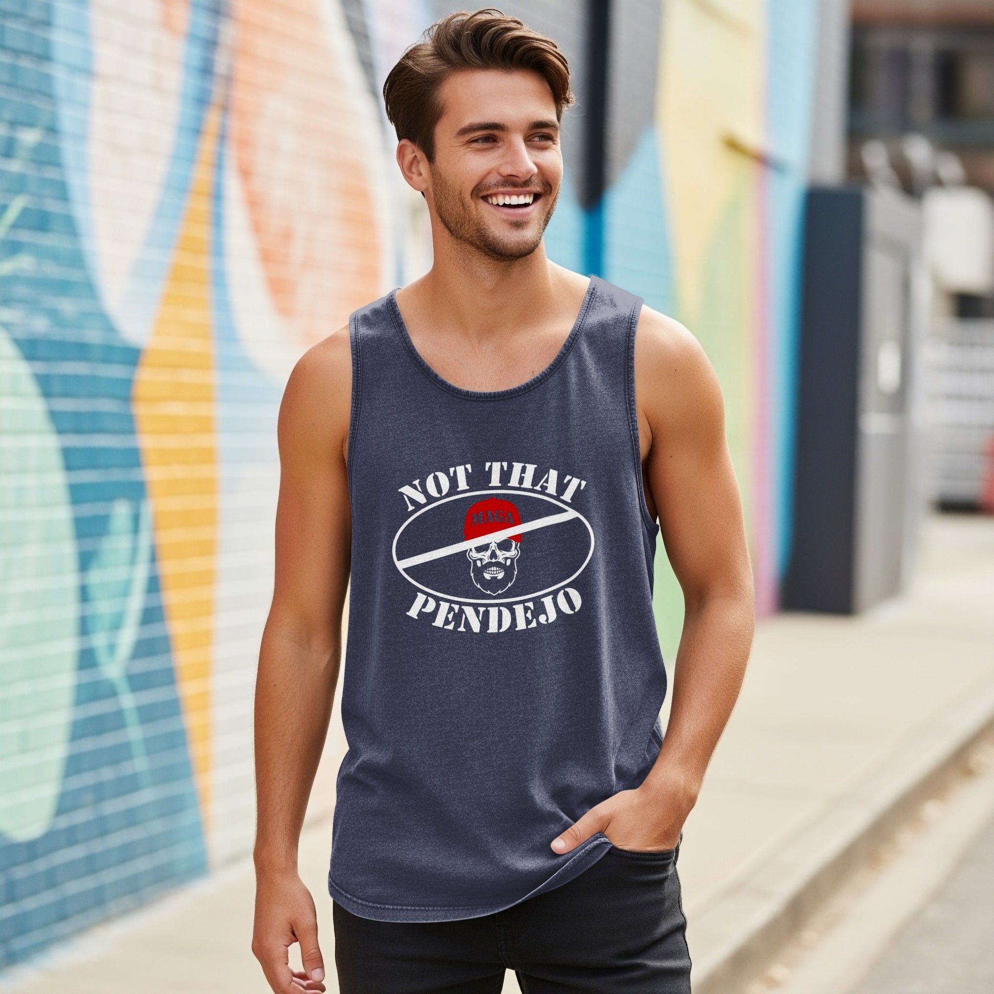 Man wearing dark tank top with "NOT THAT PENDEJO" graphic.