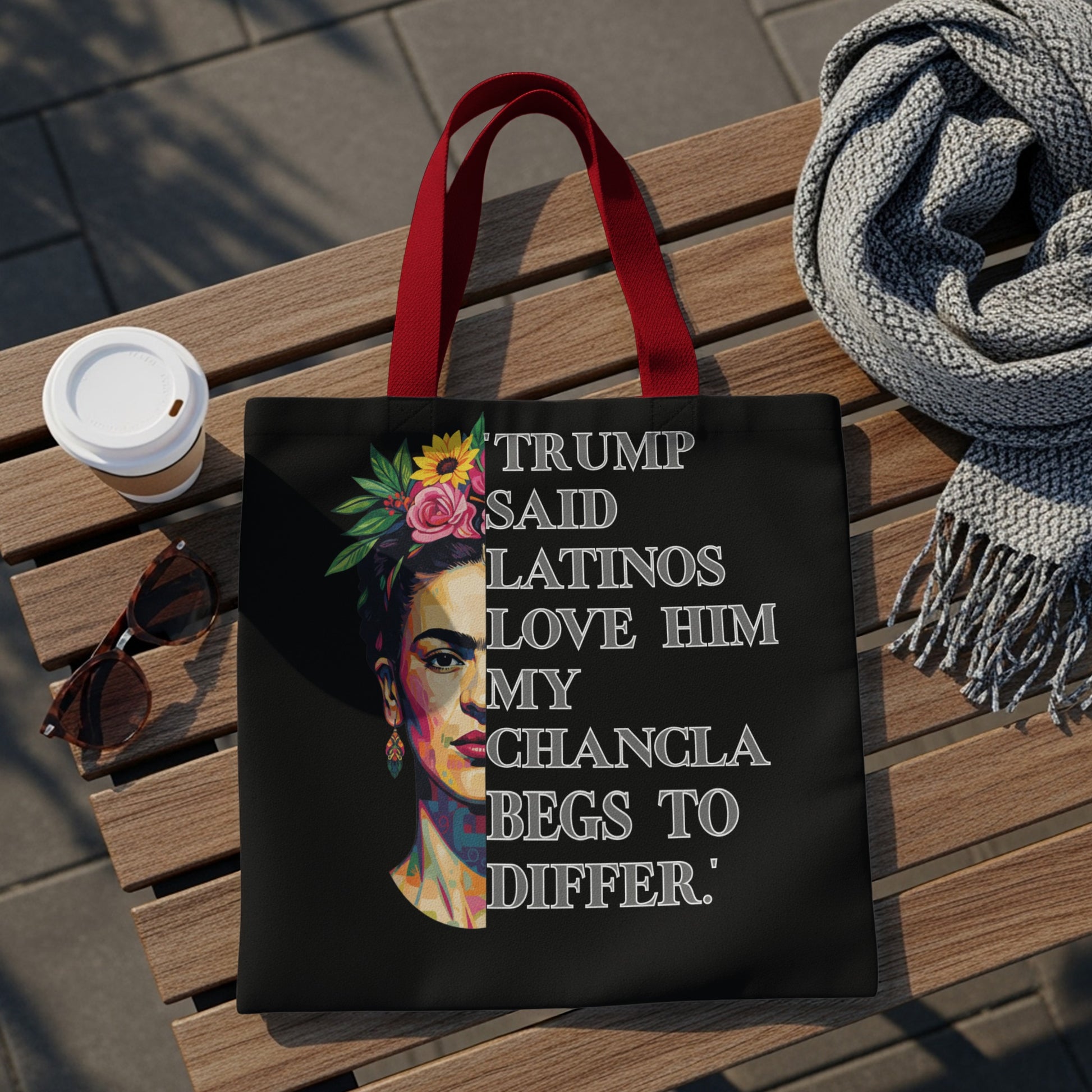 Tote bag with Frida Kahlo portrait and text saying "Trump said Latinos love him my chancla begs to differ."