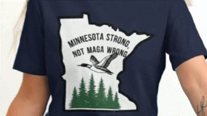 A person wearing a dark blue t-shirt with a graphic design on it.