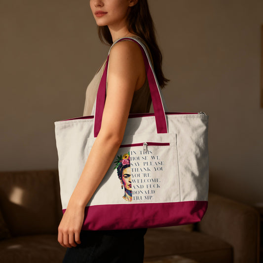 Tote bag with Frida Kahlo graphic and text: "In this house we say please, thank you, you're welcome, and fuck Donald Trump."