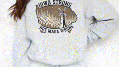 a person wearing a white sweatshirt with a graphic design on the back.