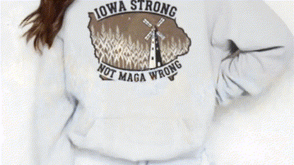 a person wearing a white sweatshirt with a graphic design on the back.