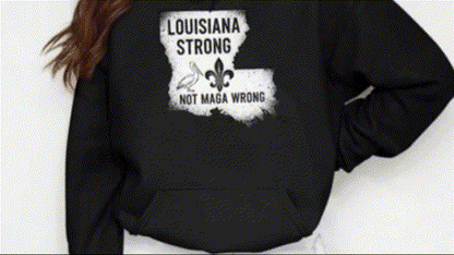 A person wearing a black hoodie with a graphic design on the back.