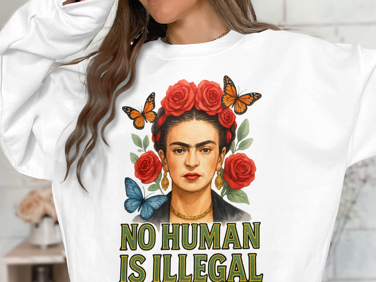 No Human Is Illegal Sweatshirt with Frida Print