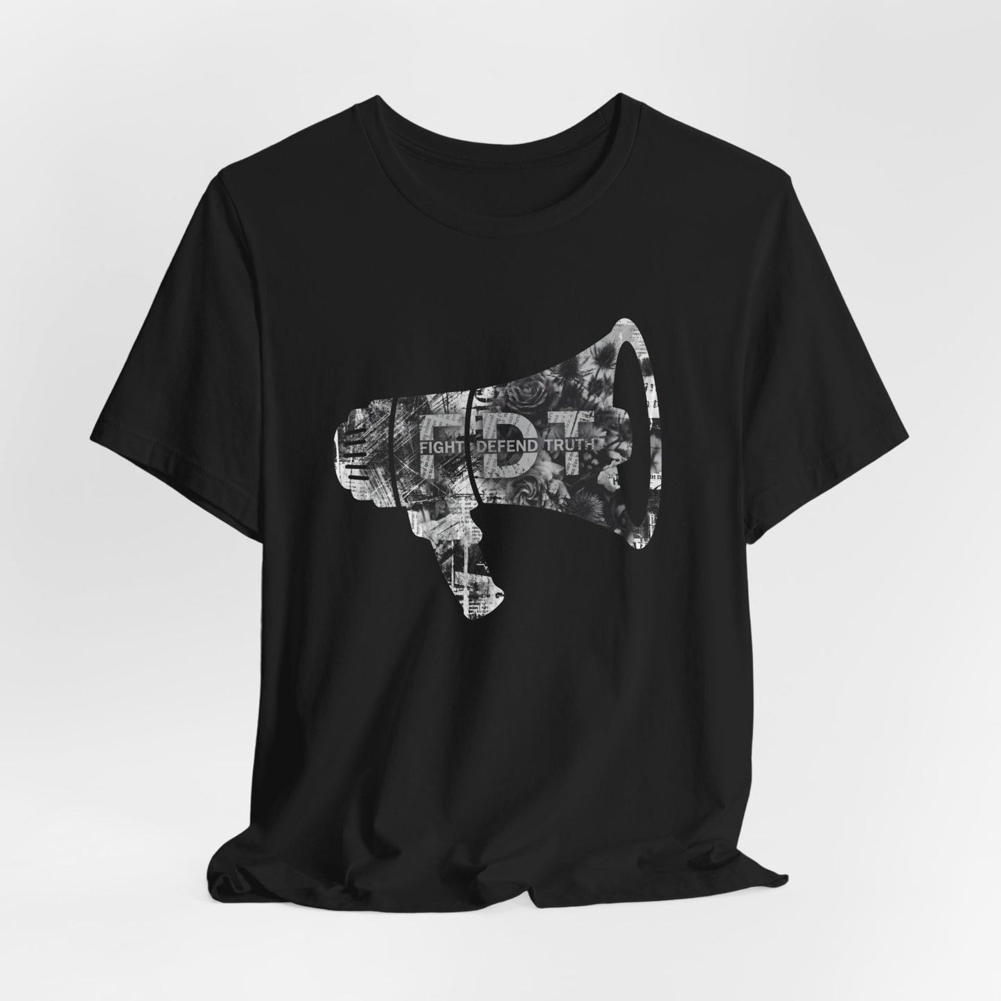 Black t-shirt with a white megaphone graphic featuring text.