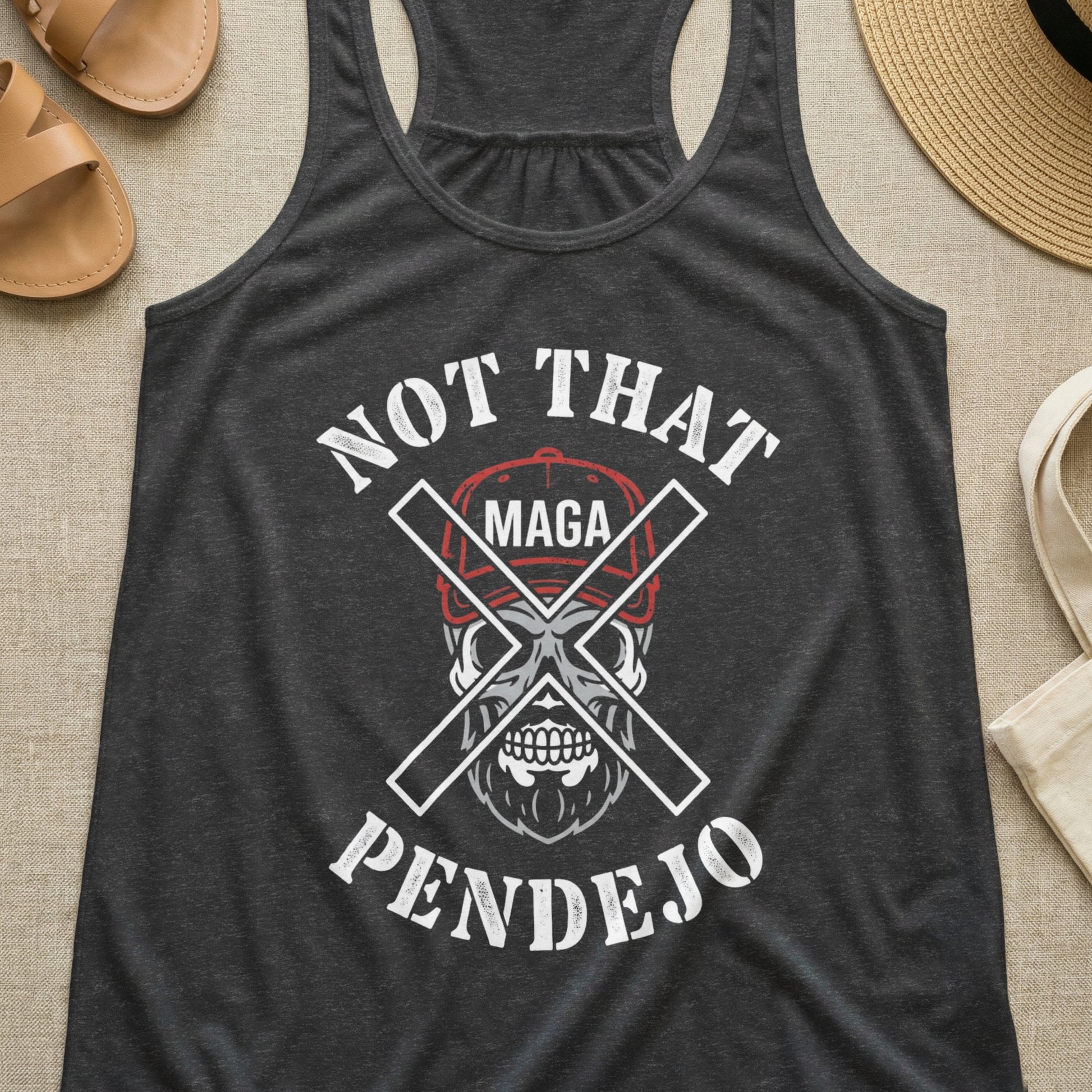 Dark grey tank top with "NOT THAT MAGA PENDEJO" text and a skull graphic.
