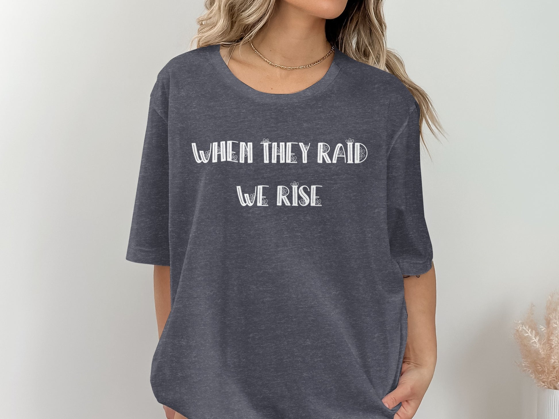 When They Raid We Rise Graphic Tee product