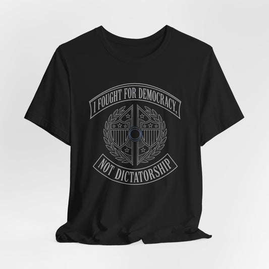 Black t-shirt with a circular emblem reading "I fought for democracy not dictatorship".
