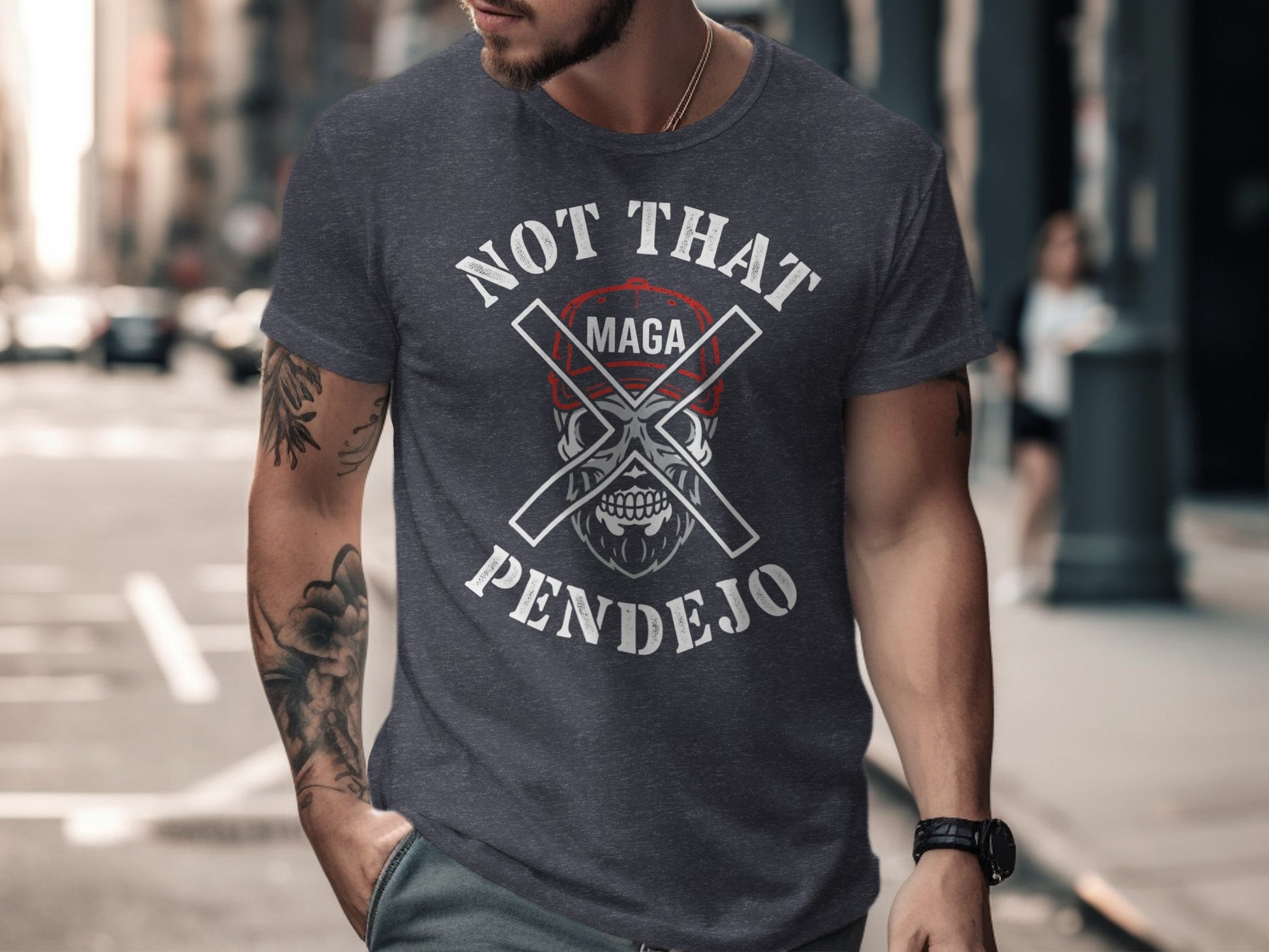 Man wearing dark t-shirt with "NOT THAT MAGA PENDEJO" text and crossed bones.