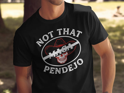 Black t-shirt with white text "NOT THAT MAGA PENDEJO" and a skull in a cowboy hat.