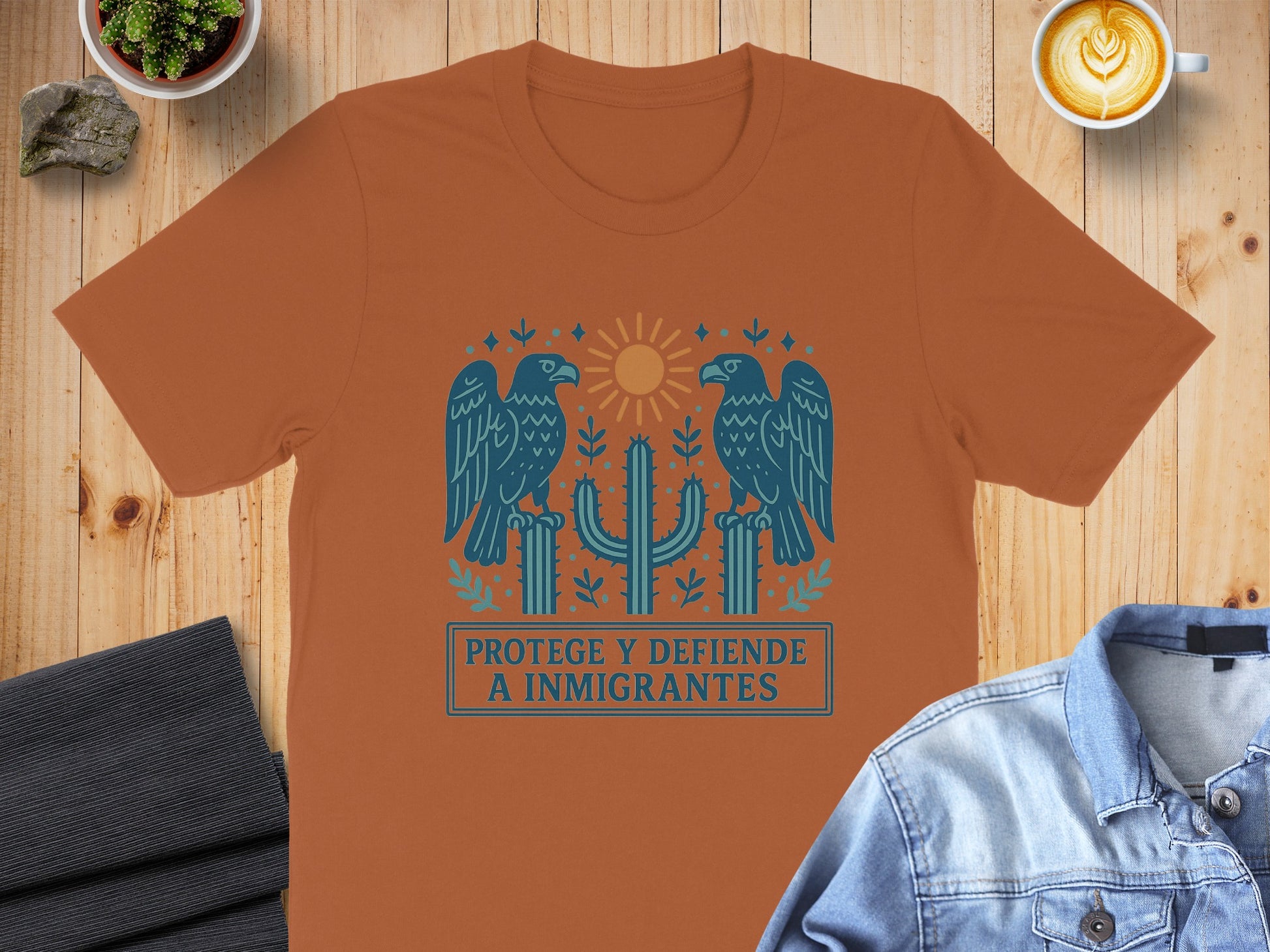 Protege y Defiende a Immigrantes Graphic T-Shirt product type