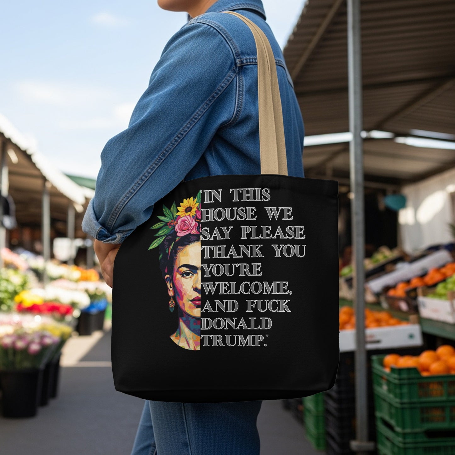 Tote bag with Frida Kahlo portrait and text: "In this house we say please, thank you, you're welcome. And fuck Donald Trump."