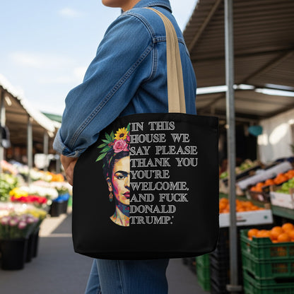 Tote bag with Frida Kahlo portrait and text: "In this house we say please, thank you, you're welcome. And fuck Donald Trump."