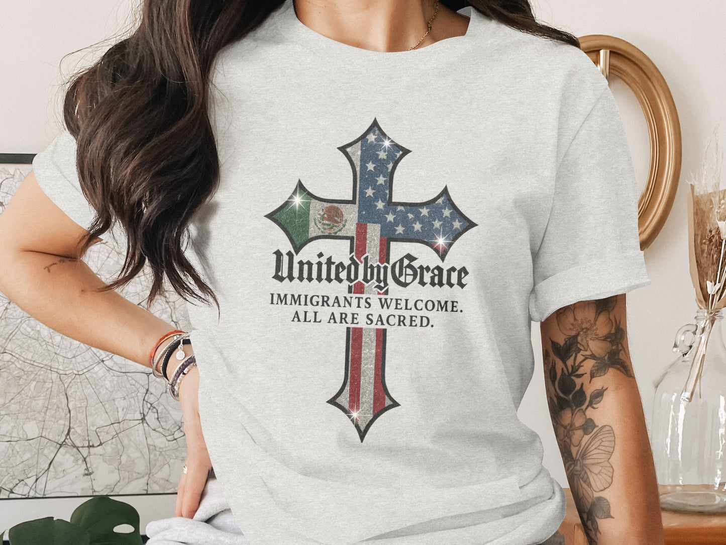 United By Grace Immigrants Welcome Sacred T-shirt product