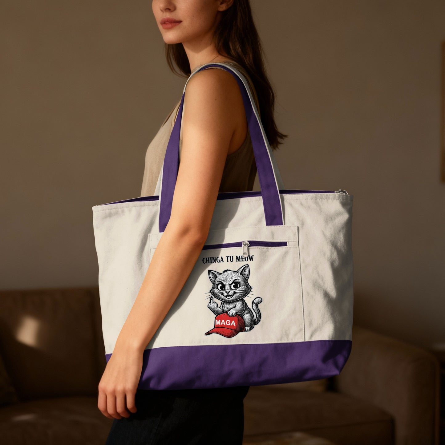 White and purple tote bag with a cartoon cat holding a red hat and text.
