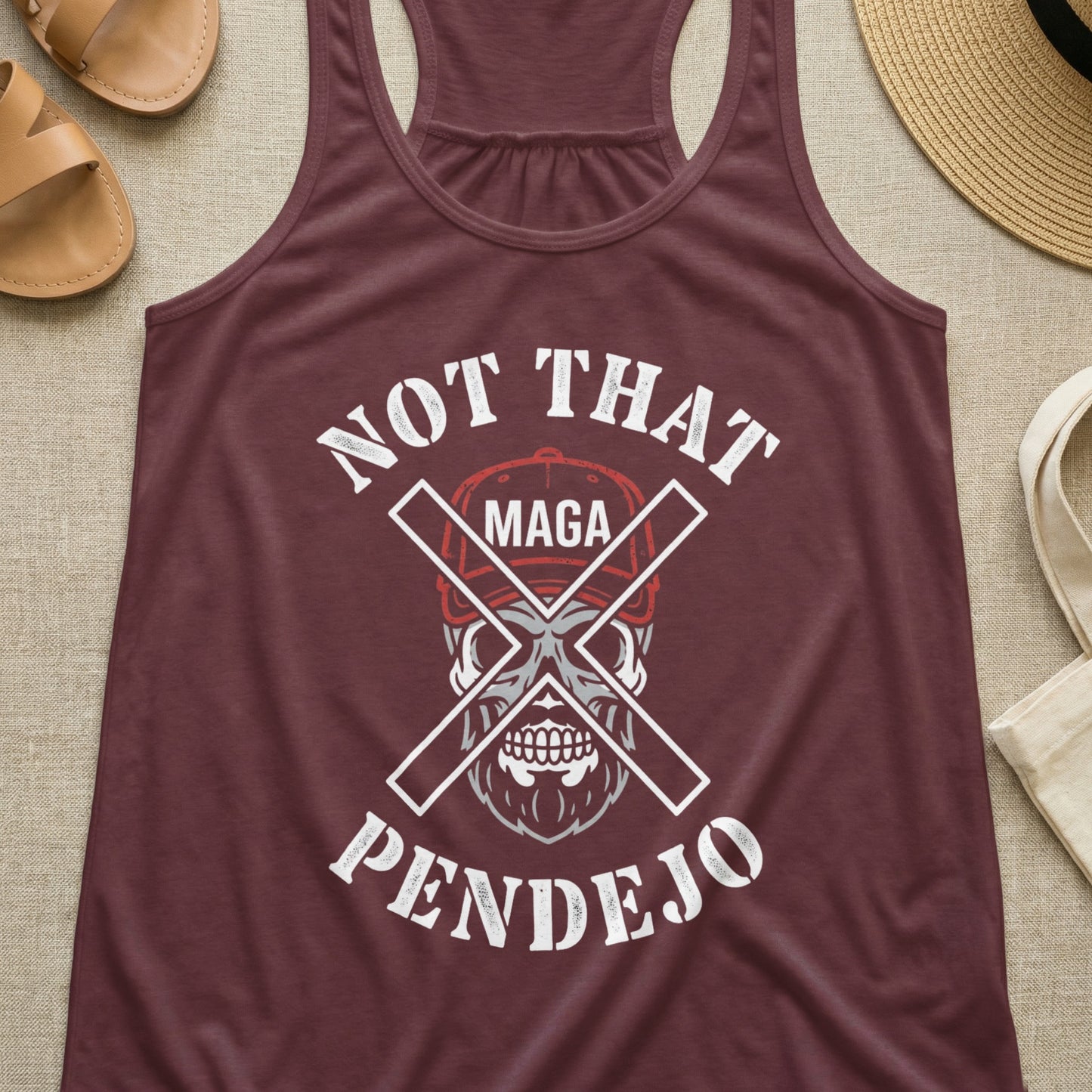 Burgundy tank top with skull graphic and text "Not That MAGA Pendejo".