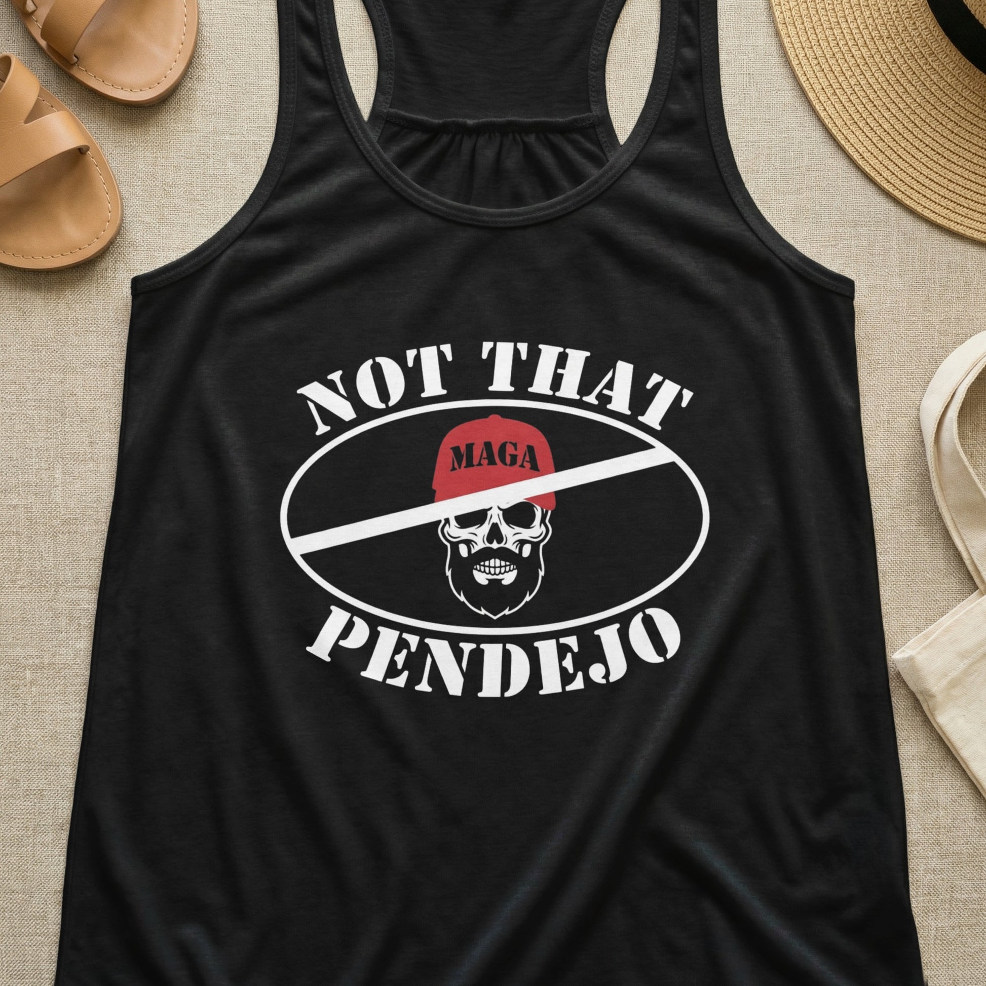 Black tank top with "NOT THAT PENDEJO" and a skull wearing a MAGA hat.