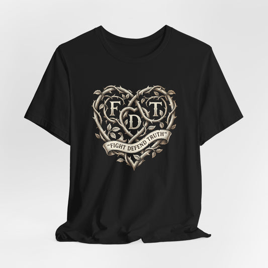 Black t-shirt with a heart-shaped thorny vine graphic and "FDT FIGHT DEFEND TRUTH" text.