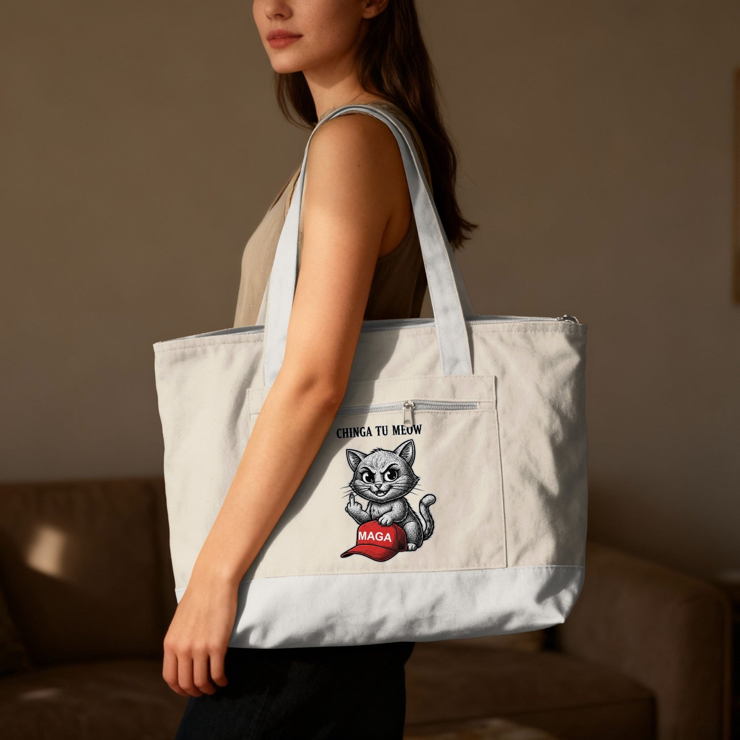 Cream canvas tote bag with a cartoon cat wearing a MAGA hat.