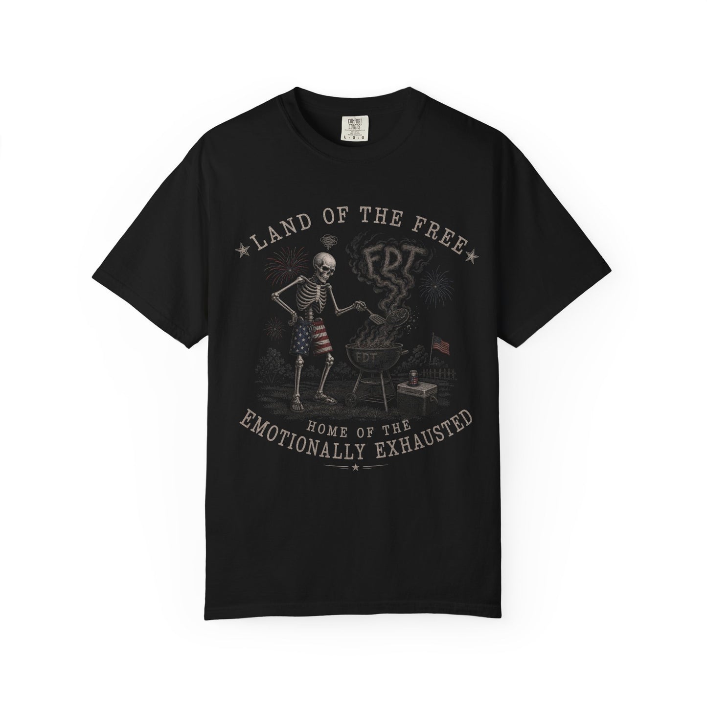 Black t-shirt with patriotic skeleton grilling, "Land of the Free" and "Emotionally Exhausted" text.