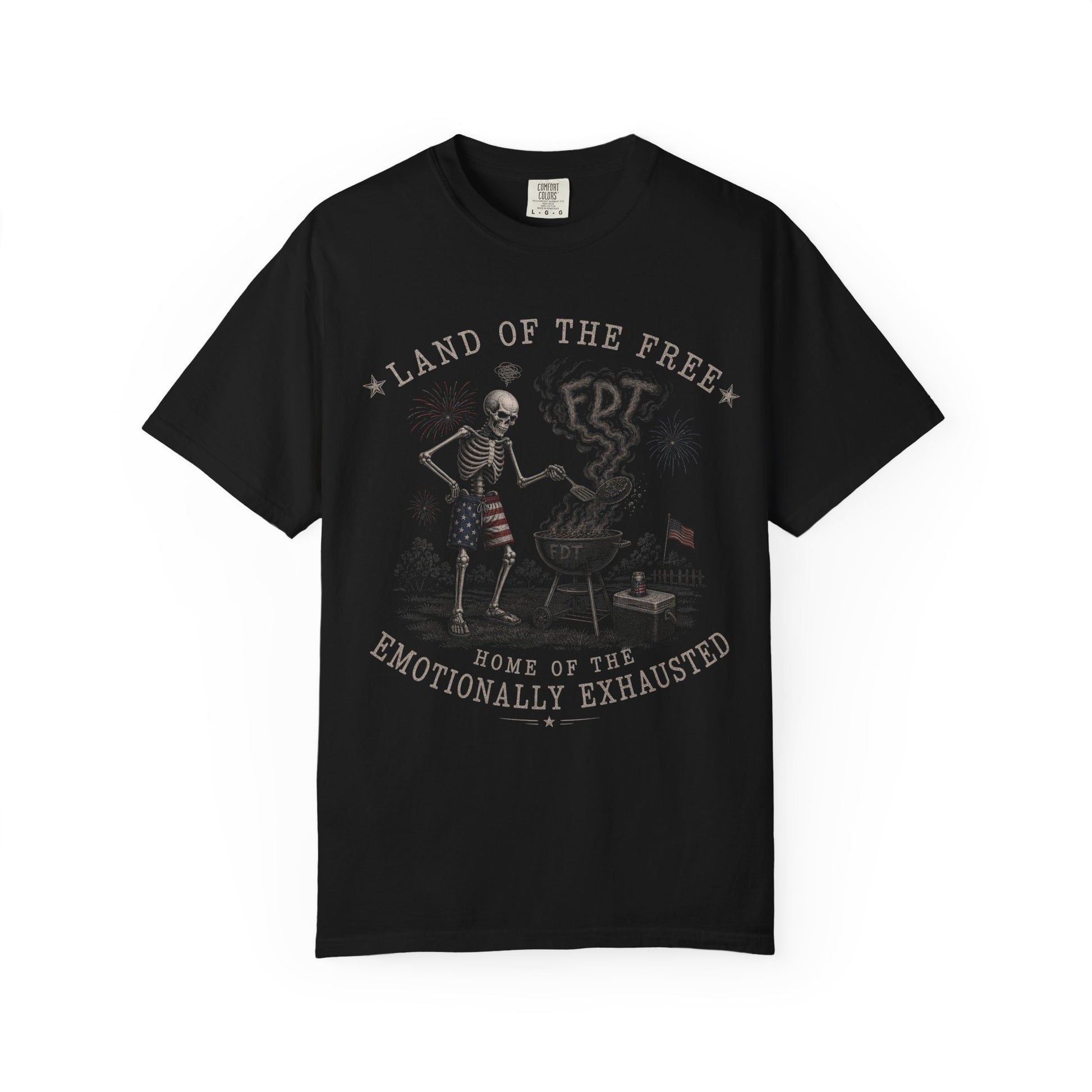 Black t-shirt with patriotic skeleton grilling, "Land of the Free" and "Emotionally Exhausted" text.