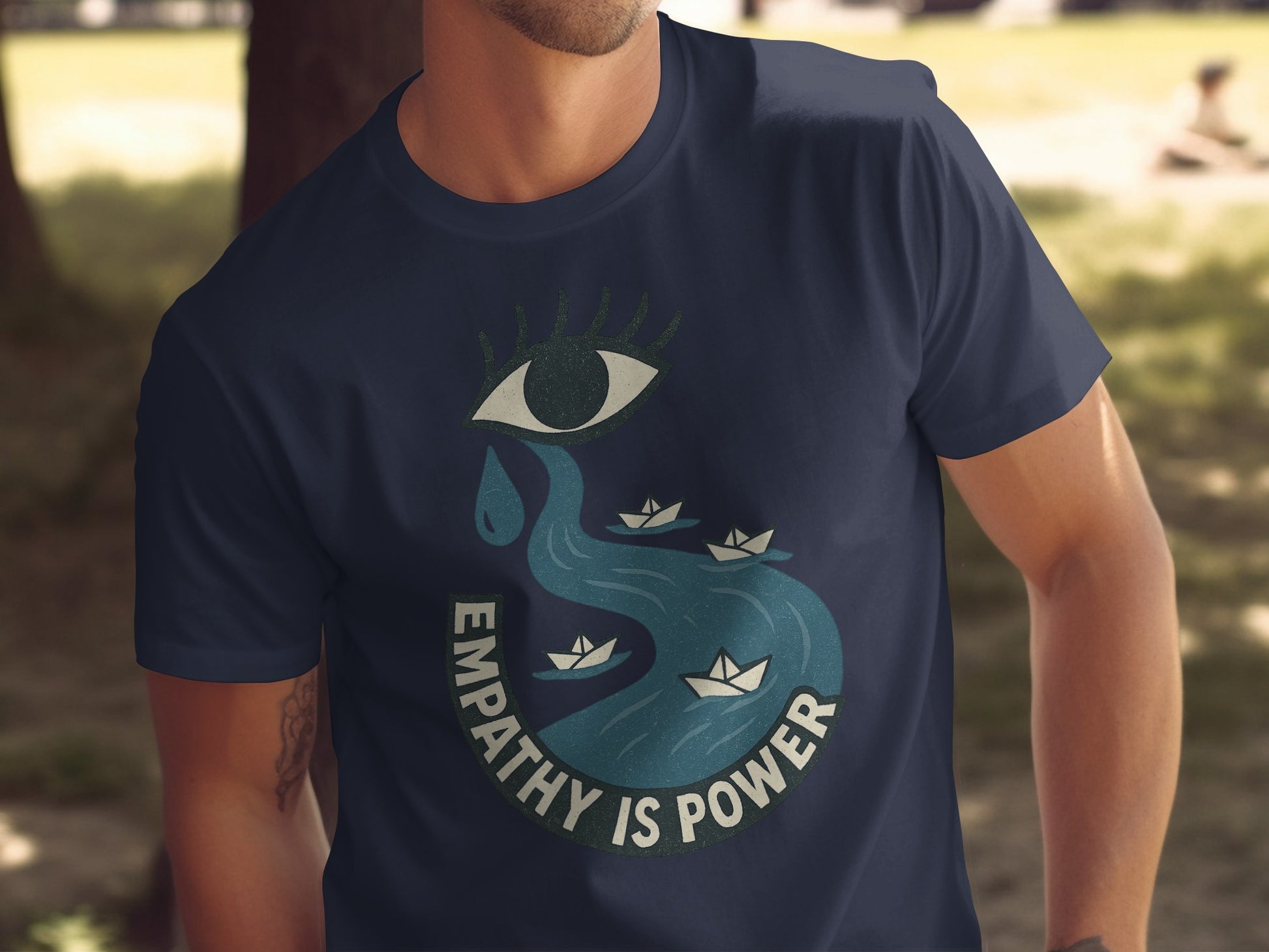 Empathy Is Power Graphic Tee Displaying Eye and River product