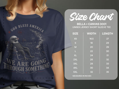 Navy t-shirt with "God Bless America" text and an eagle on a chair.
