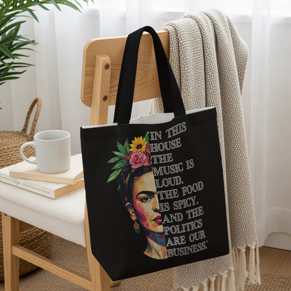 Black tote bag with Frida Kahlo art and a quote about music, food, and politics.