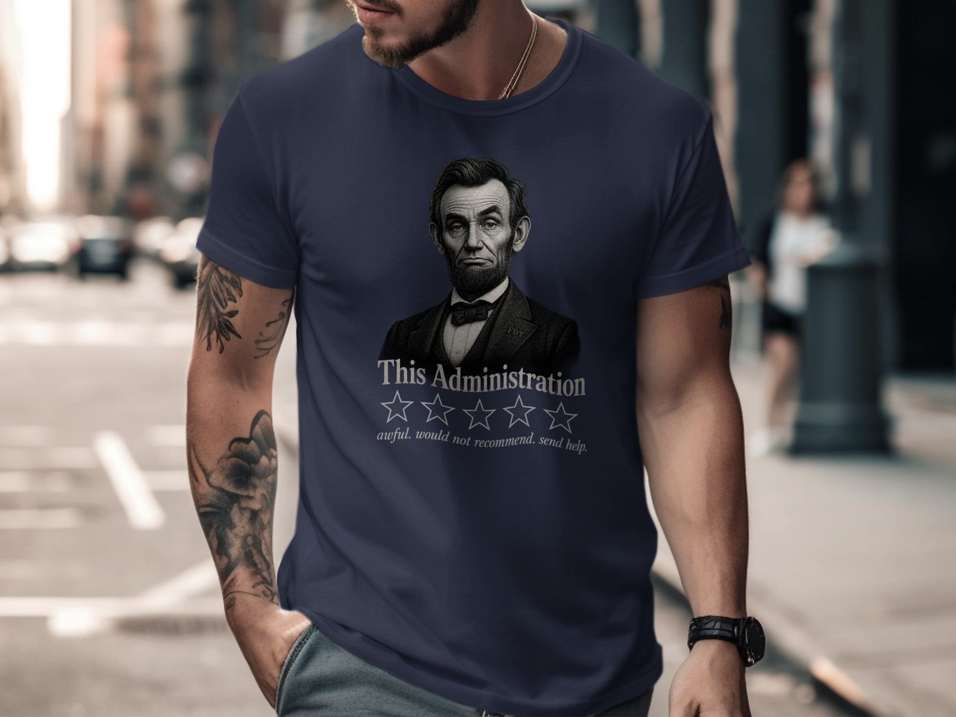 Abraham Lincoln graphic on navy t-shirt, with "awful. would not recommend. send help." text.