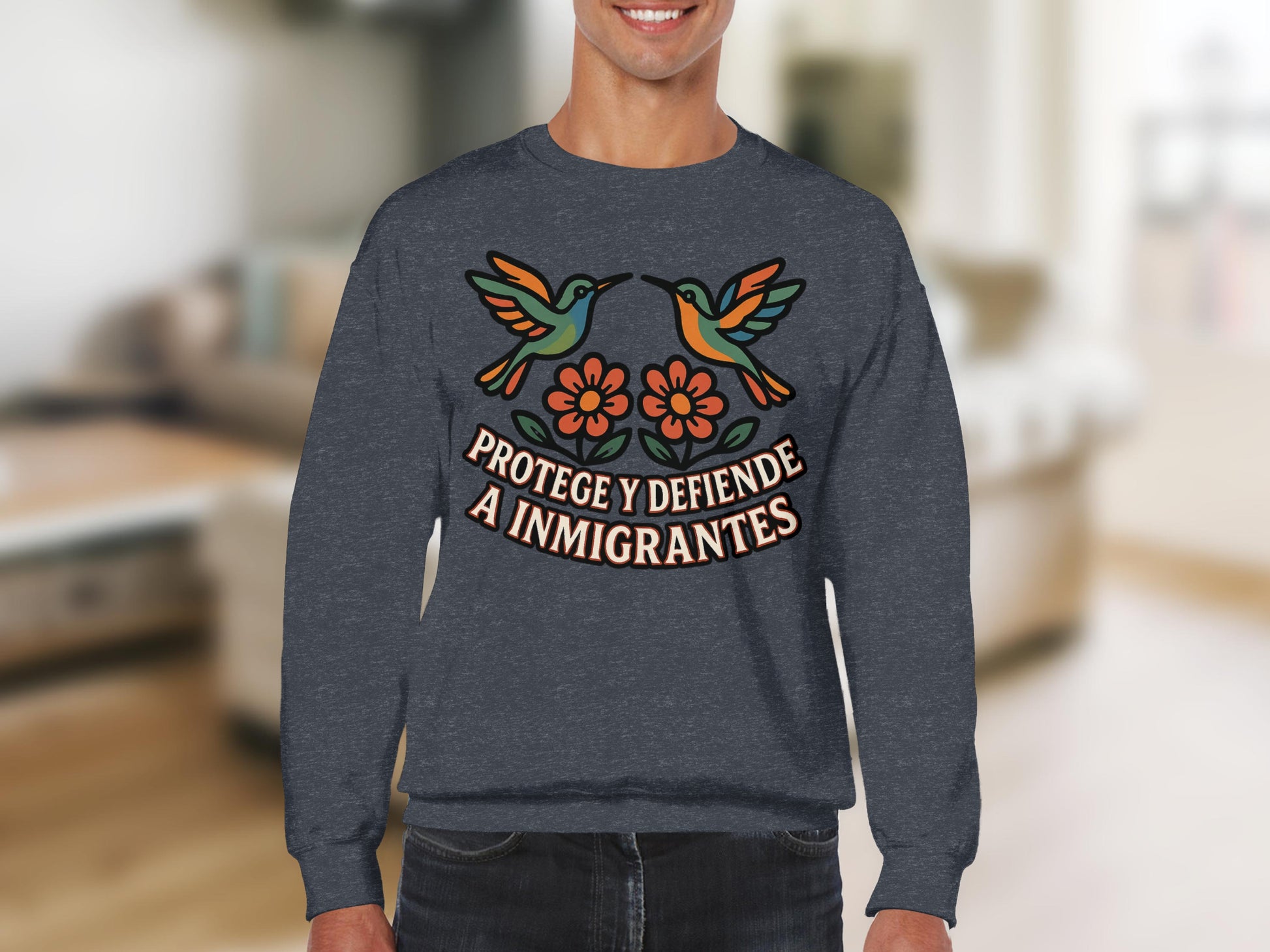 Protege y defiende a inmigrantes sweatshirt product